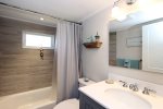 Updated bathroom with tub/shower combo